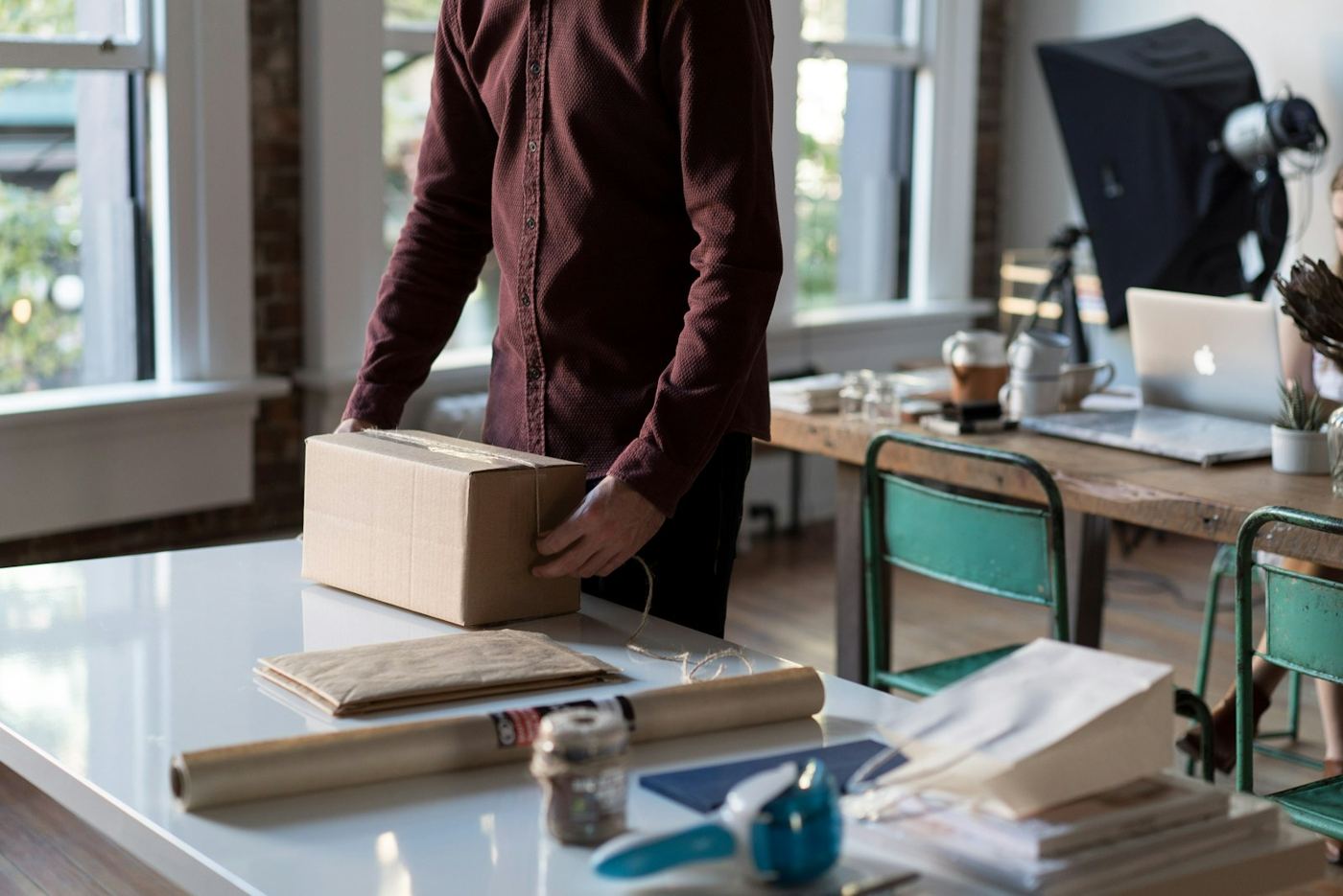 Packing a customer order at a work table